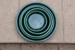 Soucoupe en terre émaillée vert Jade Les Poteries d’Albi - Ø 22 cm