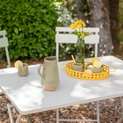 Table de jardin pliante Clivia coloris beige en acier - 110 x 70 x 71 cm